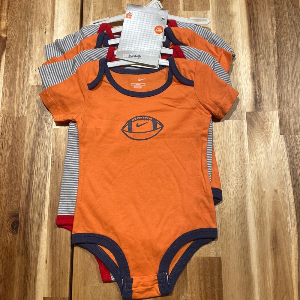 Nike baby onesies